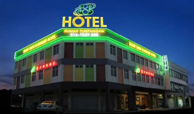 Corner elevation of 8 Days Hotel, Taman Mount Austin, lit by signage at night