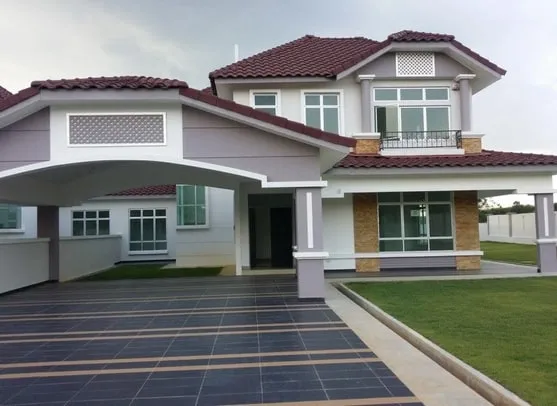 Completed two-storey bungalow with a covered driveway and tiled roof at Kulai, Johor